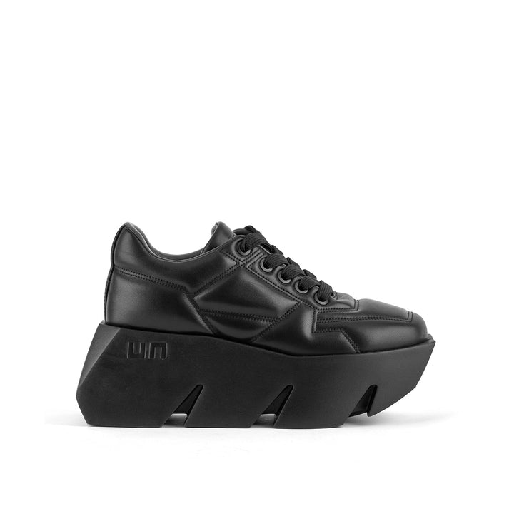 bull puffy sneaker black 1 outside view