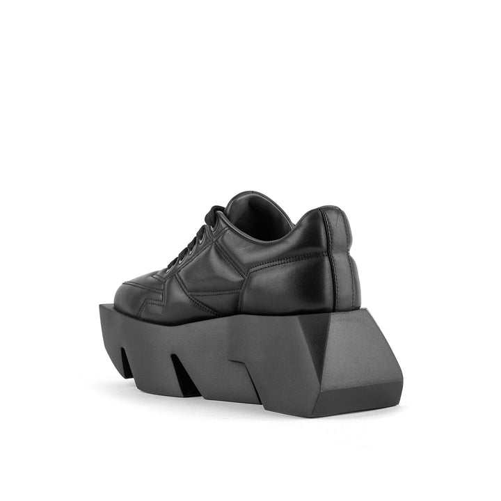 bull puffy sneaker black 4 angle in view