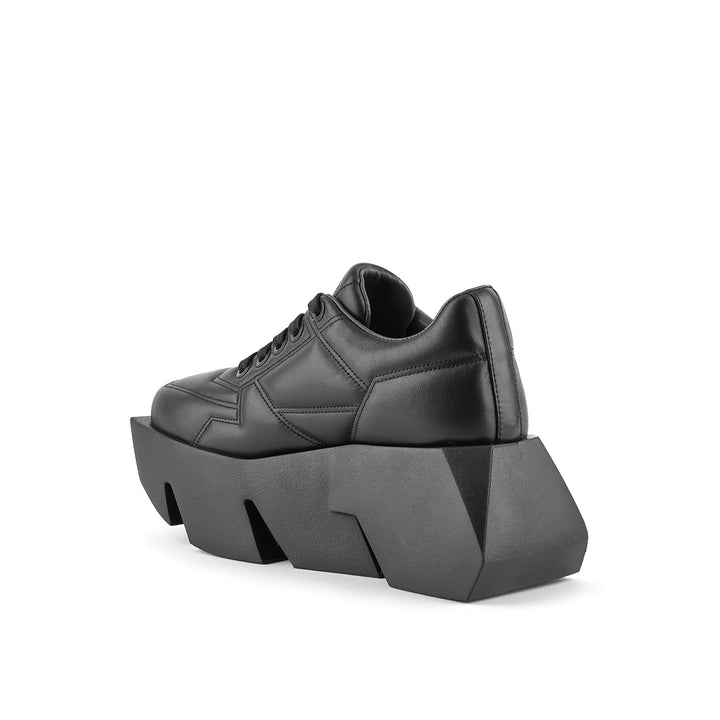 bull puffy sneaker black ii 4 angle in