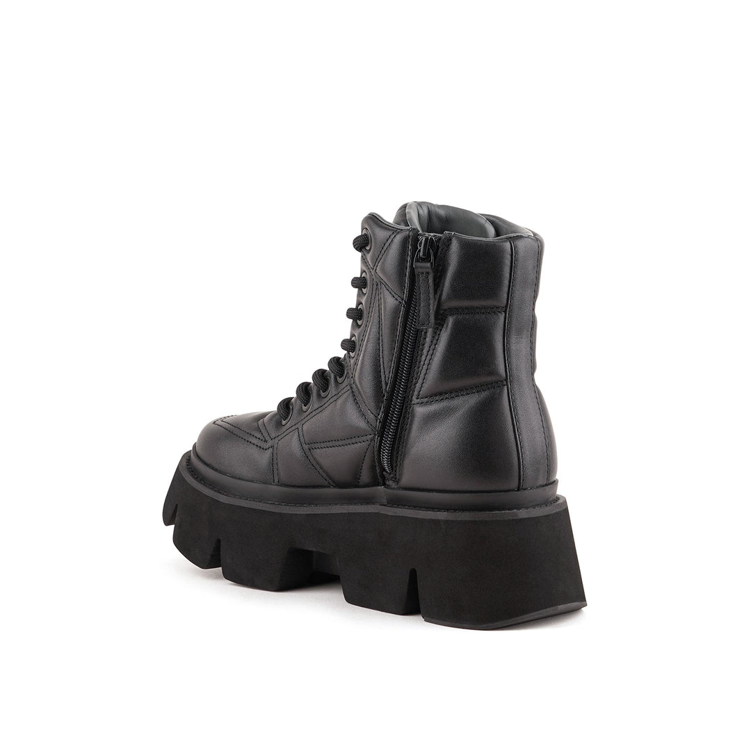 stomper puffy combat black 4 angle in