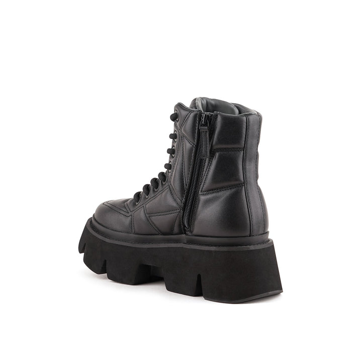 stomper puffy combat black 4 angle in